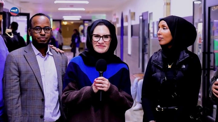 Lt. Gov. Peggy Flanagan dons a hijab in a visit to a Somali market as fraud scandal unfolds
